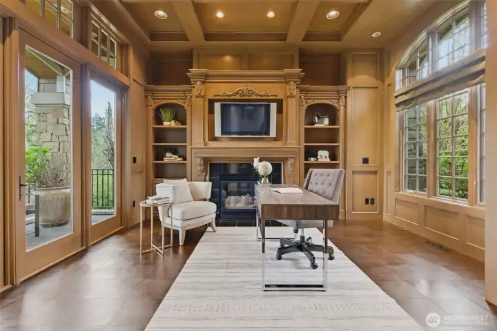 There's an impressive office on the main floor with floor to ceiling wood paneling and leather floors - unexpected, luxurious and just one example of the intention behind design and craftsmanship of this home