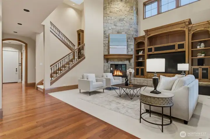 Another view of the family room, showing the second staircase going up to the South wing of the second floor.