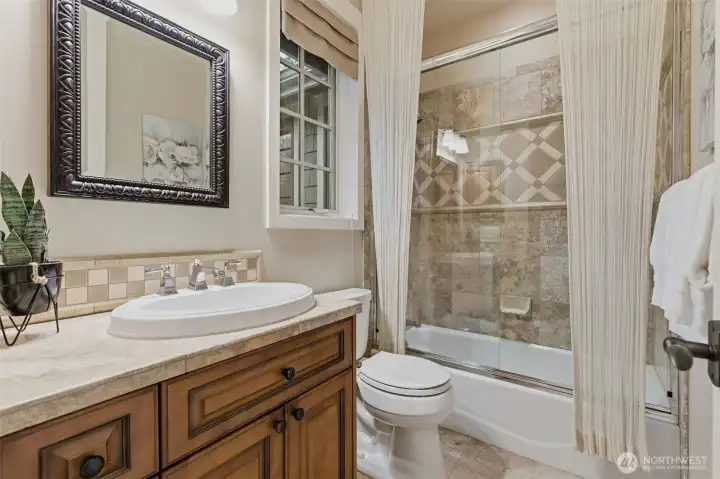 Full ensuite bathroom off the guest room.