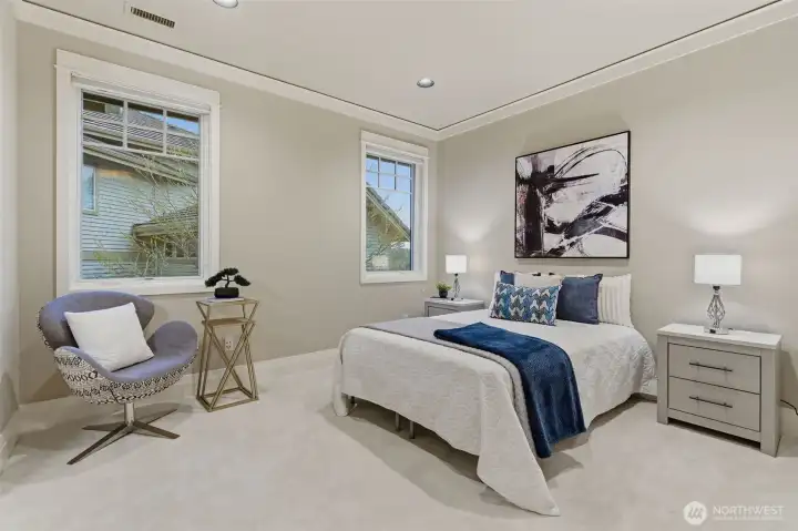 There are two additional bedroom at the far end of the house, nicely separated from the primary suite, yet not too far away!