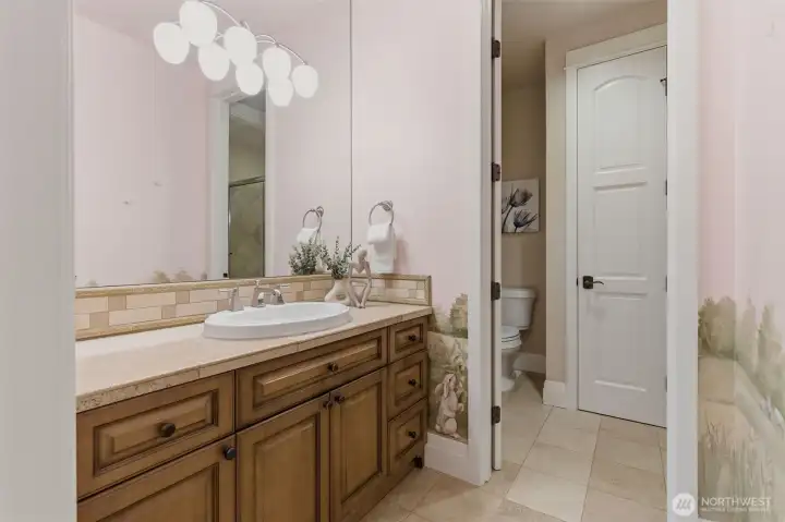 You get a better idea of the hand painted artistry of this bedroom and bathroom - birds, bunnies and Cody the Dog all feature in the artwork.