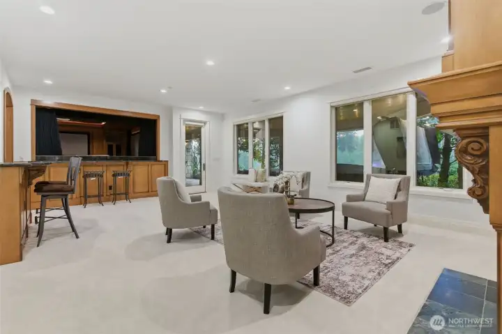 With movie theatre was thoughtfully designed to provide dual viewing capability - enjoy from the inside or from the large rec room. Remote controlled velvet drapes can be closed for an intimate movie experience, or left open for more social Game Day viewing.