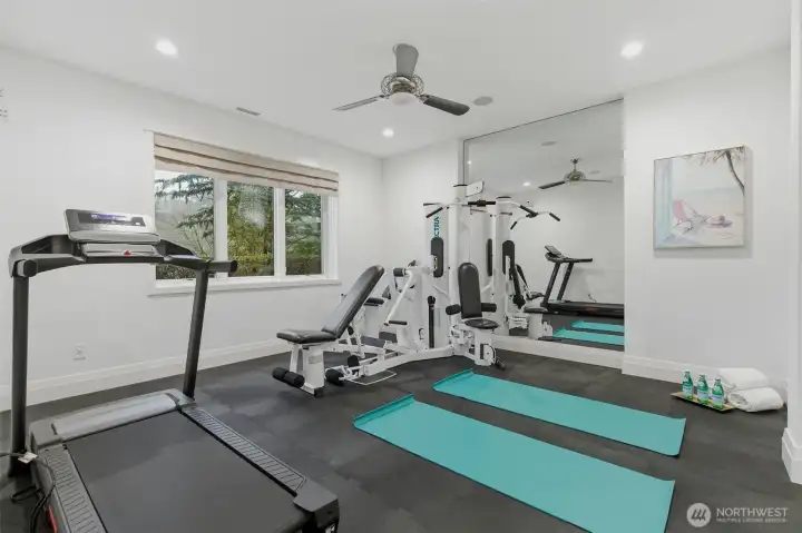 There's no need to pay for a gym membership!  There's a large home gym. The universal weight system and treadmill will stay with the home