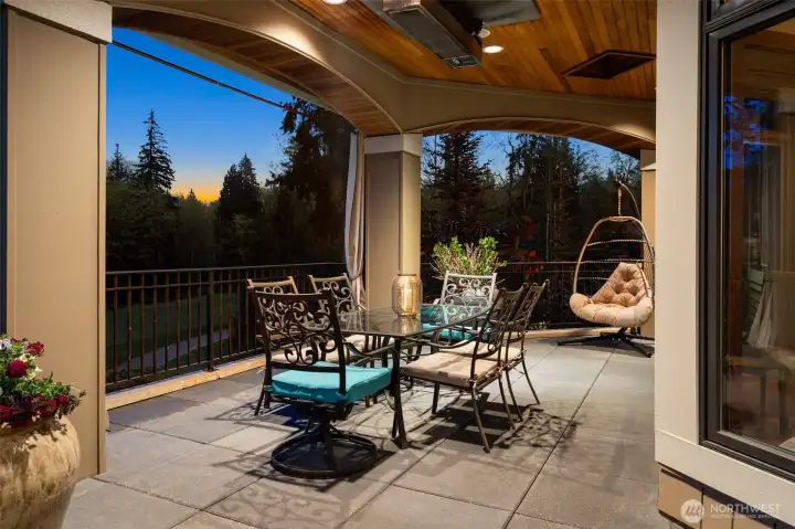 The indoor outdoor living offered by this house is incredible with two fully covered decks. The upper deck, just off the kitchen features a large built in grill (not shown) and is a wonderful spot to enjoy an alfresco meal. With a ceiling mounted electric heater, you can be out here whatever the weather