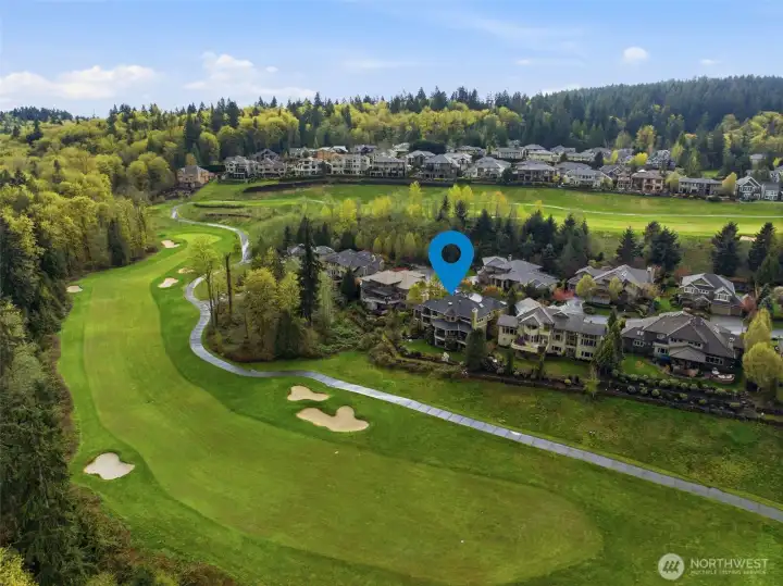 This house is uniquely situated to overlook the 4th hole of the China Creek Golf Course. The land beyond the course is Cougar Mountain Park, owned by King County - non-builable, ensuring privacy and protected views