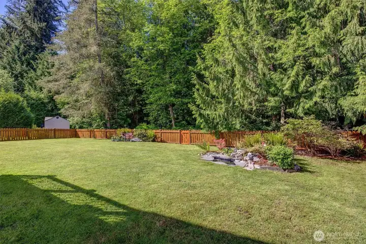 Level, sunny, private, fully fenced yard