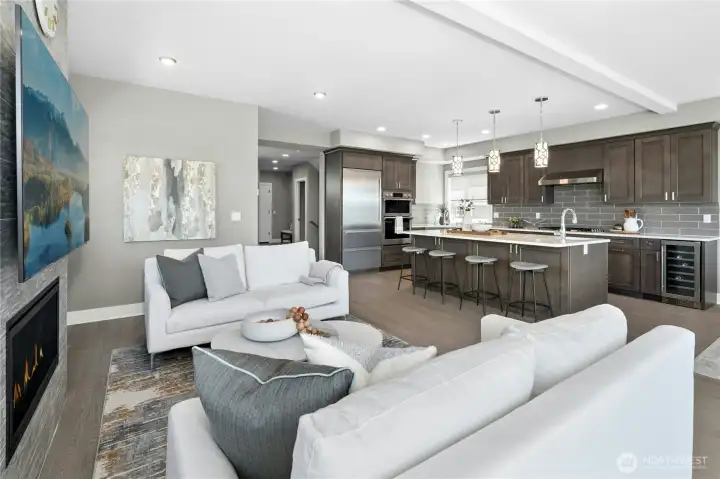 Open concept - kitchen flows into well-lid living space