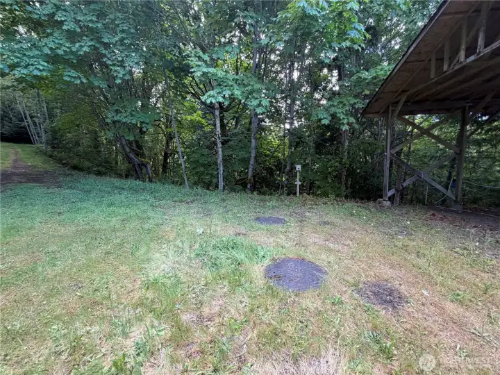 Septic tank with lids so it can be driven over. Septic tank with lids so it can be driven over.