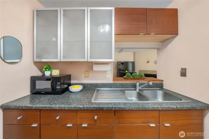 Kitchen window to the living room, is great for entertaining.