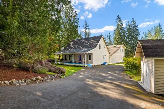 Lovely Woodinville home with large 3-bay shop set on 1.2 acres.