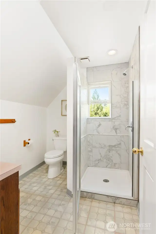 Newly installed shower with lovely tile surround close to your 2 upstairs bedrooms