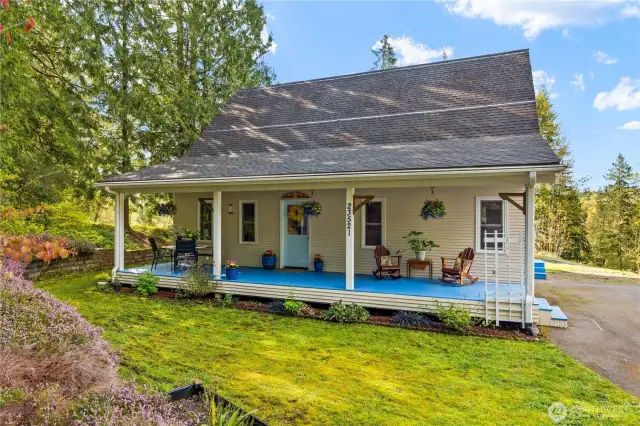 Relax and enjoy the peace and quiet on your spacious and fully covered front porch.