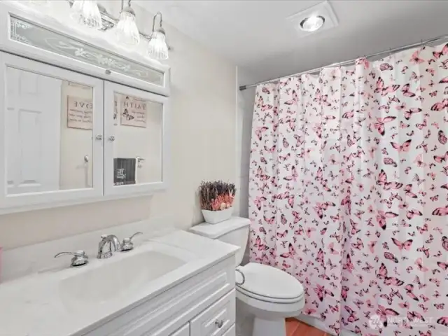 Newer cabinets in both bathrooms with upgraded fixtures.