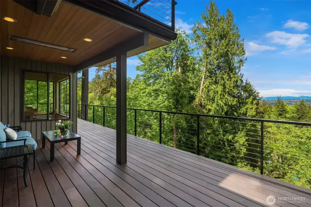 Overhead heaters provide year-round outdoor enjoyment on the covered deck.