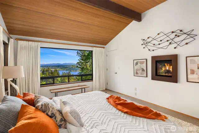 Enjoy lake views by day & the cozy fireplace at night.