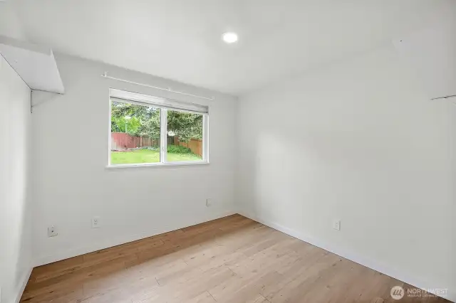 Another bright and spacious bedroom with backyard views—ready to be personalized for comfort, rest, or creativity.