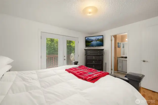 Primary: 3/4bath and French doors to the deck