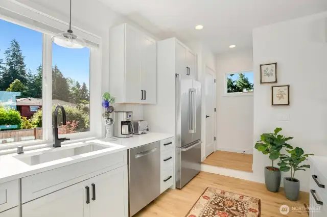 kitchen, pantry and entry to stairs