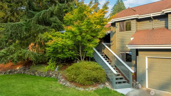 Stairs lead up to entryway& large covered porch. Stairs are NEW.