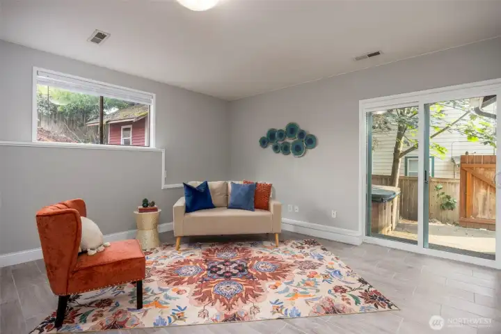 Bonus family room downstairs with new slider to outside patio and hot tub.