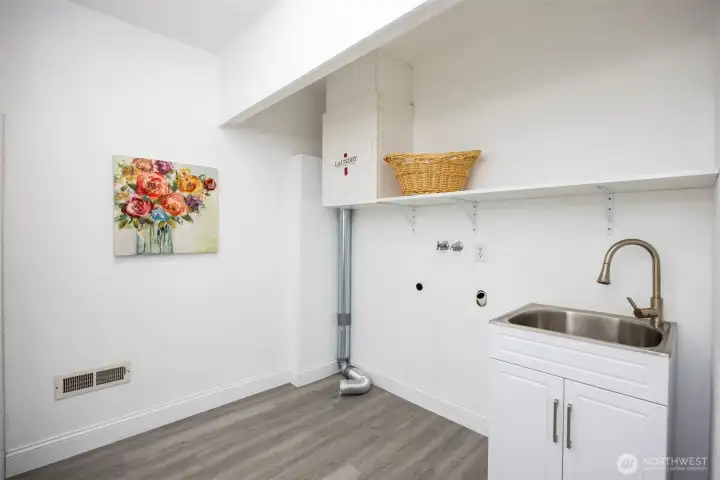 Laundry room and large laundry sink!