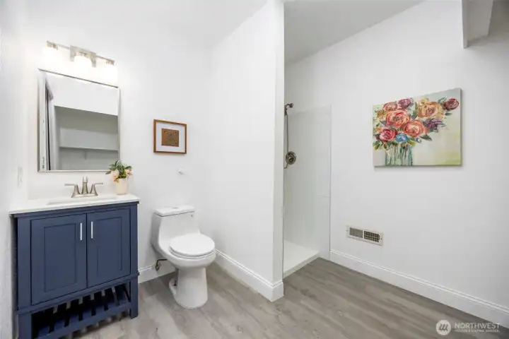 3/4 bath in laundry room in lower level of the home.