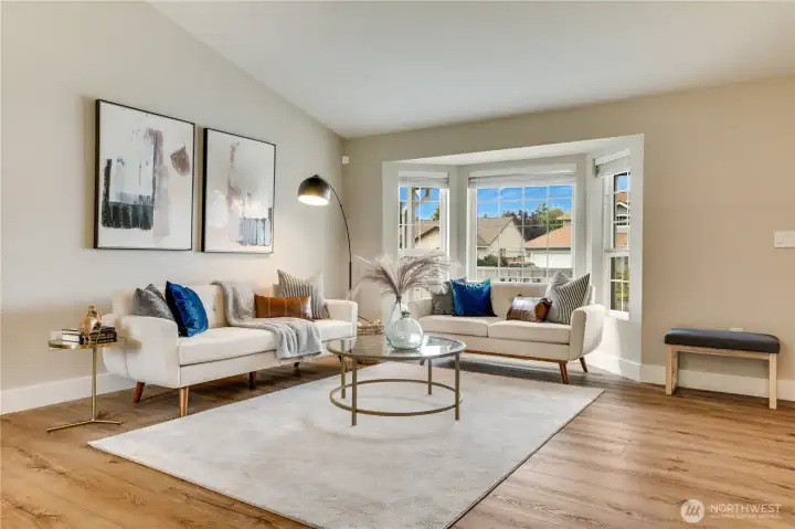 A vaulted ceiling in the living space and the open layout make the house feel even bigger than it is.
