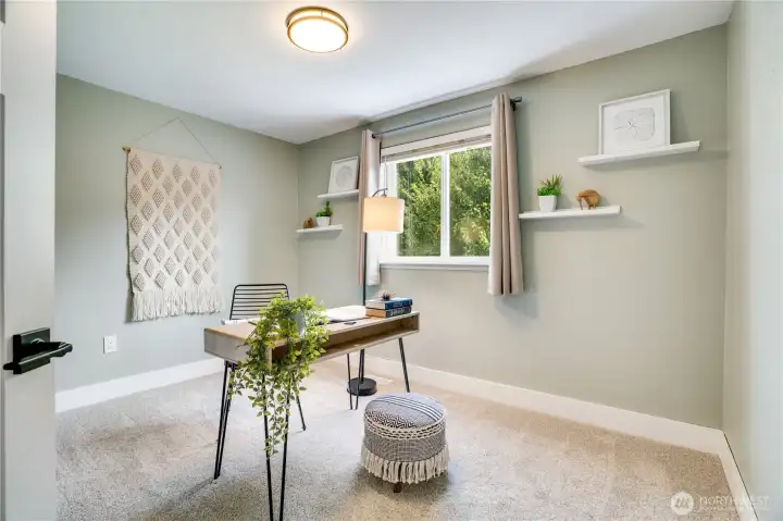 Both back bedrooms fill with natural light each morning through their east-facing windows overlooking the back yard.
