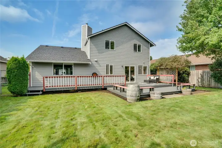 The homeowners also installed a sprinkler system for easier care of this beautiful, fully-fenced back yard.
