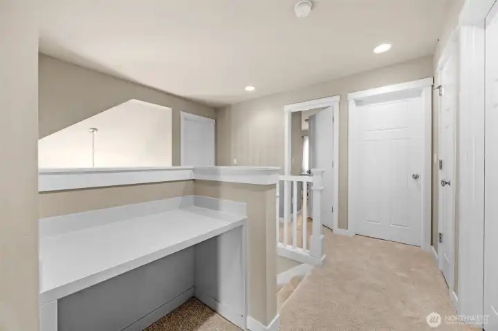 Open Upper Hallway with study desk/flex space
