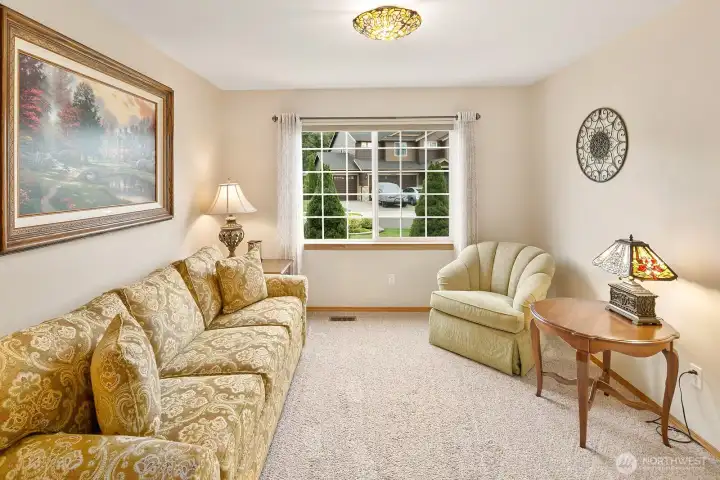 Living room or change it up to a main floor office!