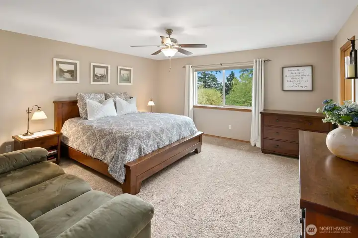 The primary suite is a spacious retreat with greenbelt & territorial views!