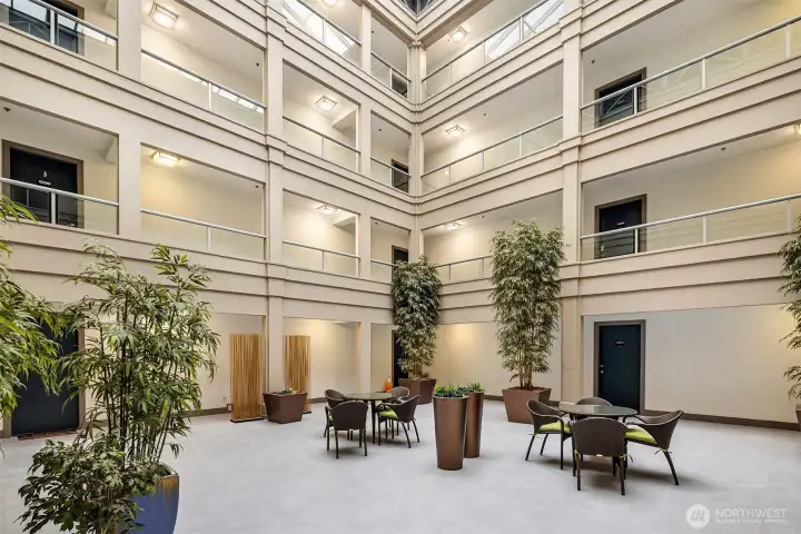 Upon entering the secured building, the atrium lobby brings in loads of light!