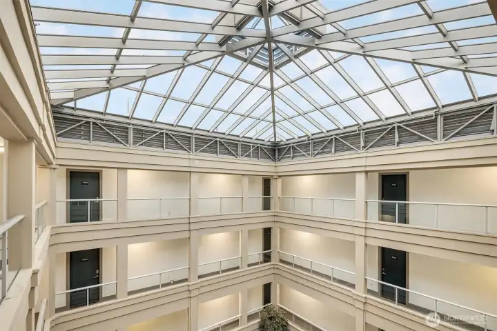 Up on the top floor, this corner end unit will not disappoint!