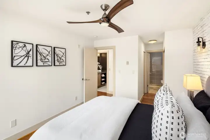 From primary bedroom: full bathroom in the hallway, ensuite bathroom just past the closet.