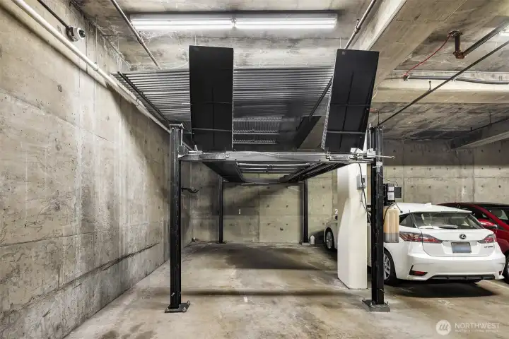 On the 1st floor, secured parking.  This spot is one of a few that has lift parking, allowing for 2 cars (or, use the top for storage).