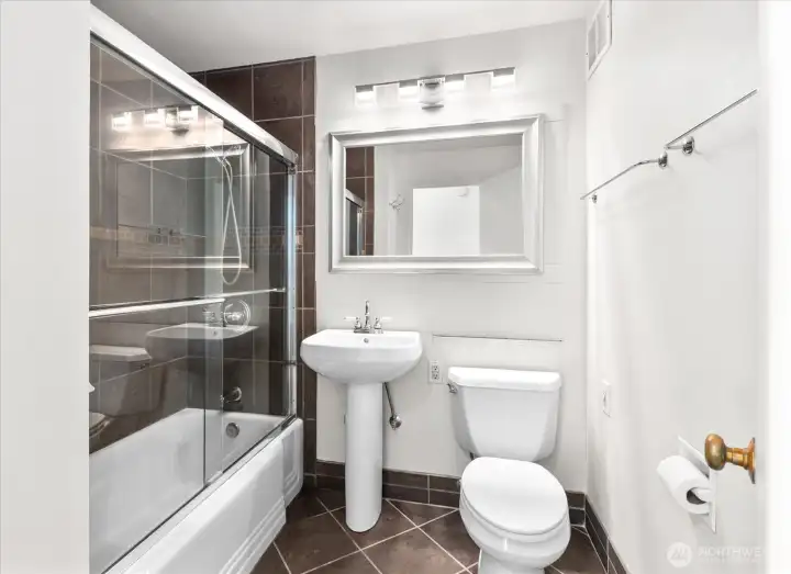 Updated Full Bathroom that still nods to the Vintage Era