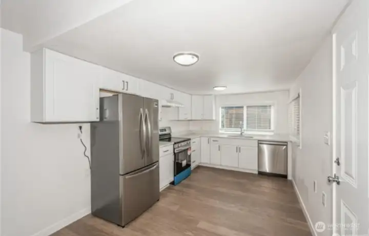 Modern kitchen equipped with stylish stainless steel appliances for a clean, contemporary look