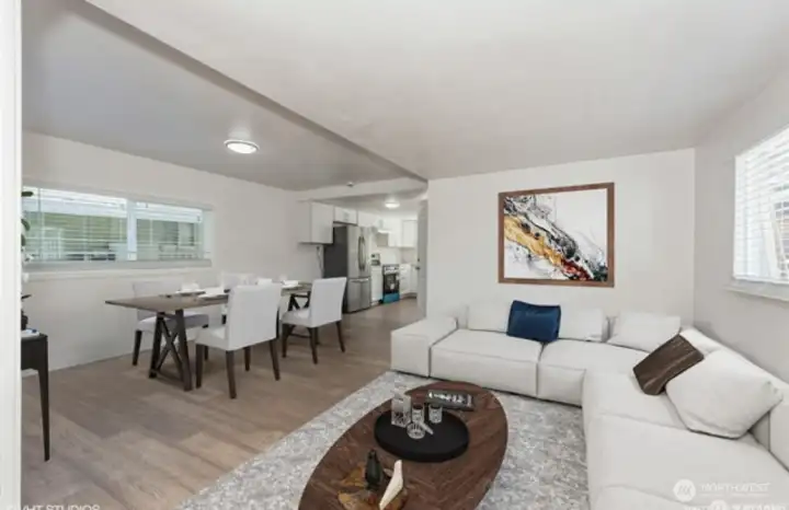 Bright, open concept living area designed for comfort, connection, and effortless entertaining.