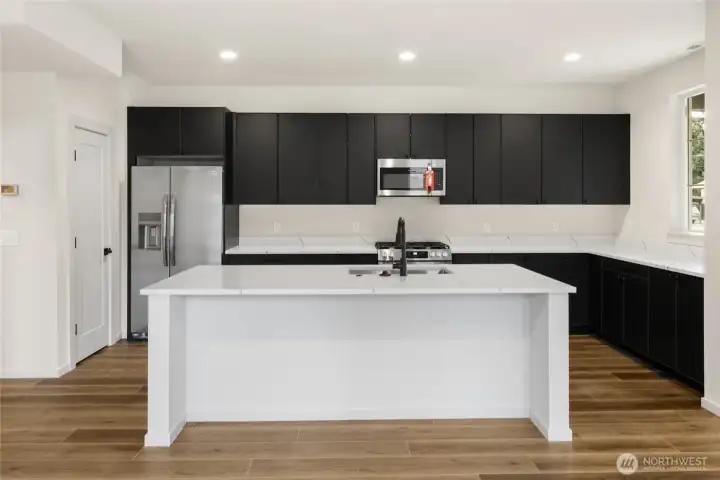 Photos, plans and elevations may be examples representing the community, community  amenities, homes or artist’s renderings that may not accurately represent the actual  condition of a homesite or home as constructed, and may also contain options and  upgrades which are not included in the sale. Trailside Homes reserves the right to make  changes to floor plans, specifications, dimensions, design and elevations without prior  notice. Stated dimensions and square footage, if applicable, are estimated and should  not be used as representations of the home’s actual size