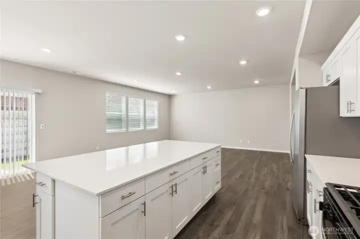 Beautiful large island with quartz countertop. hotos are representative only and may display different color package and/or upgrades.