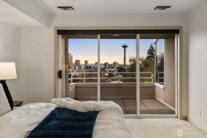 Primary bedroom features its own private deck.