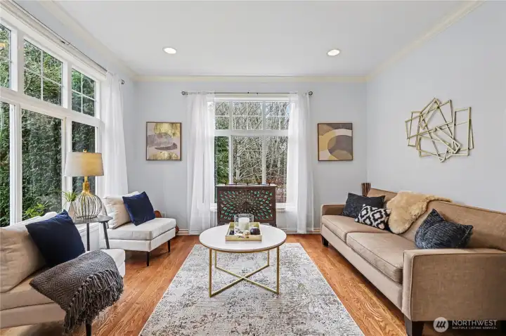 Bathed in natural light, this is the sitting room in front of house