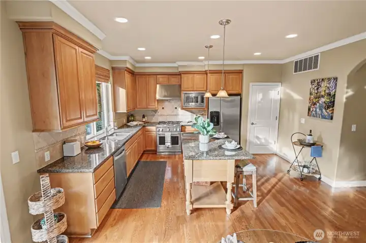 Spacious kitchen with large center island is the perfect gathering space