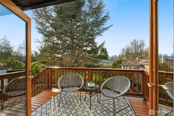 French doors off the kitchen open to a west-facing deck.