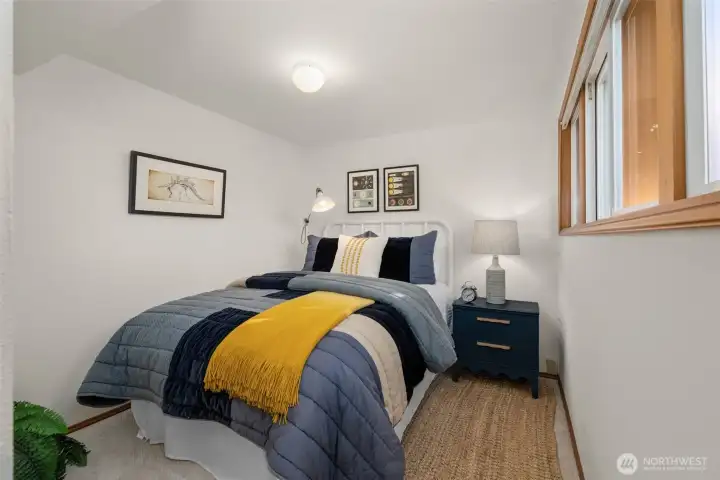 An additional room provides flexible space that could easily become a third bedroom, home office, or gym.