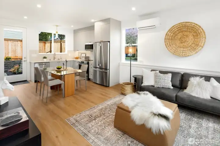 Open concept living/dining/kitchen.