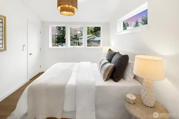 Primary suite has vaulted ceilings, walk-in closet and en suite bath.