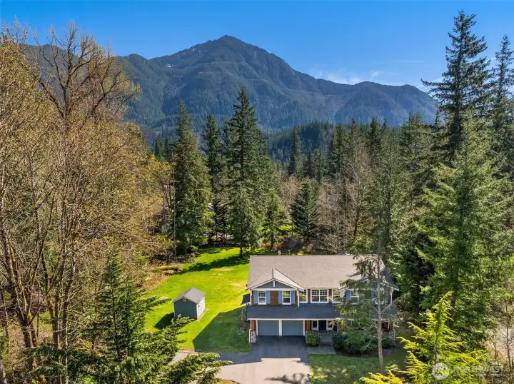 Set on over 3.5 acres of private, serene North Bend landscape.