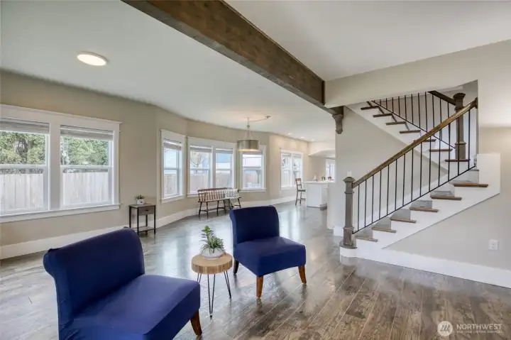 Gorgeous staircase and exposed wood beams